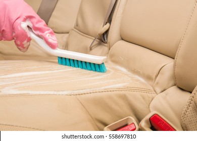 Car Interior Leather Seats Professionally Chemical Cleaning With Brush. Early Spring Cleaning Or Regular Clean Up.