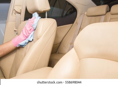 Car Interior Leather Seats Professionally Chemical Cleaning With Cloth. Early Spring Cleaning Or Regular Clean Up.