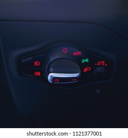 Car interior with light switch.the light knob in the car. Multifunction Headlight Console Control Switch Knob