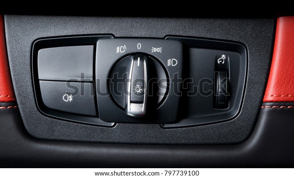 Car interior with\
light switch.the light knob in the car. Multifunction Headlight\
Console Control Switch Knob