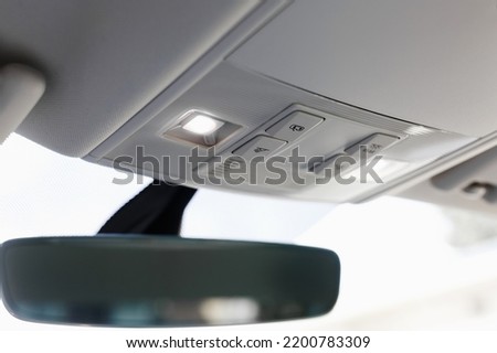 Car interior lighting ceiling close up.