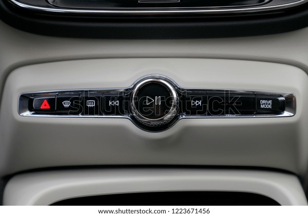 car interior. sound system, driving,\
mirror and rear window resistance control\
buttons.