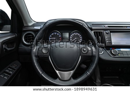 car Interior - steering wheel, shift lever and dashboard, climate control, speedometer, display  on white isolated background
