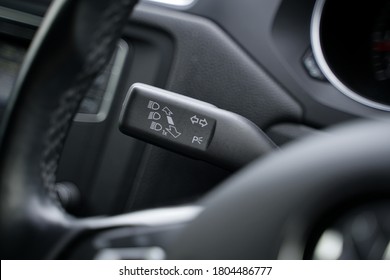 Car interior with turn signal switch (selective focus on signal switch) 