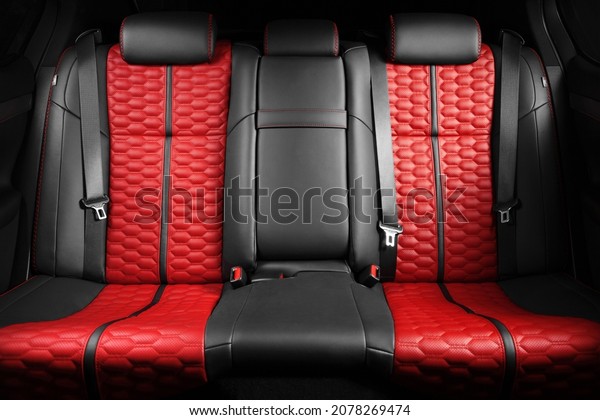 Car interior upholstery design\
luxury and stylish red black leather seats with\
alcantara
