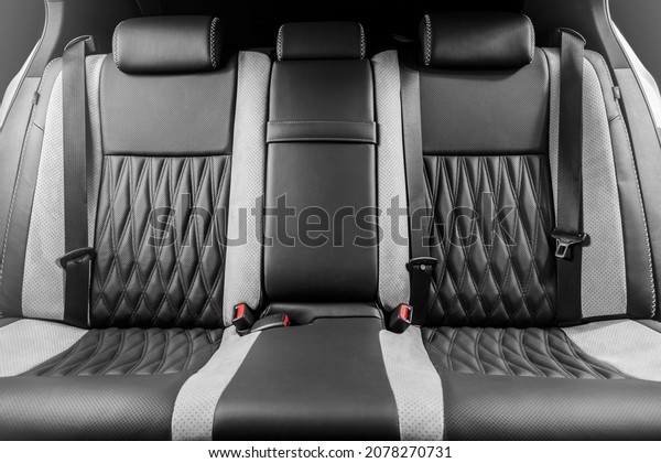 Car interior upholstery design\
luxury and stylish white black leather seats with\
Alcantara