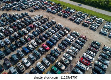 Car junk yard with salvaged cars - Shutterstock ID 1125561707