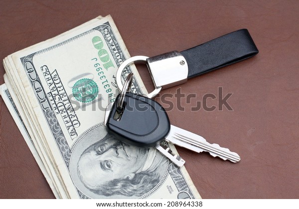 car key with\
dollars