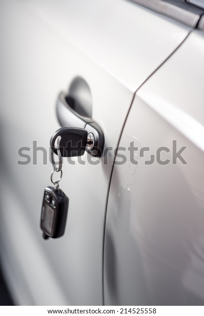 Car key in the door\
lock