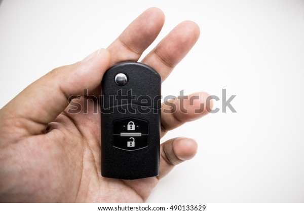Car Key in\
Hand