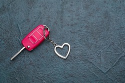 Car Key With Heart Shape Keychain On Dark Background