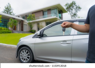 Car Key Holder In Front Of New House