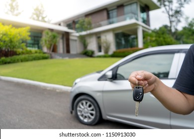 Car Key Holder In Front Of New House