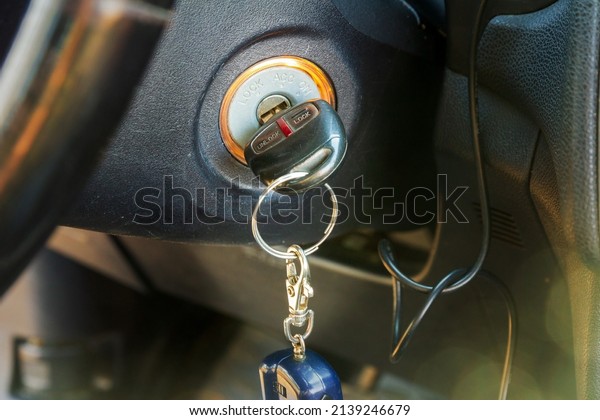 car key in\
the ignition with a key fob for\
alarm