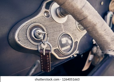 Car Key In The Ignition Lock Of A Vintage Car