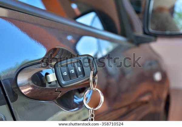 Car key is inserted\
in a slot car keys.