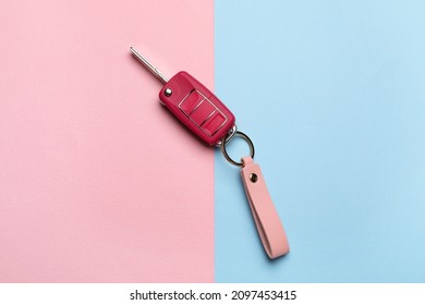 Car Key With Leather Keychain On Color Background