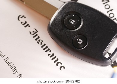 Car Key On An Insurance Policy