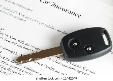 Car Key On An Insurance Policy