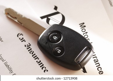 Car Key On An Insurance Policy