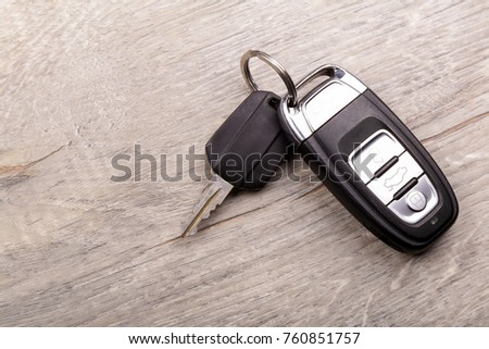 Car key on a wooden background
