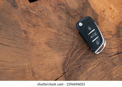 Car Key On Wooden Table