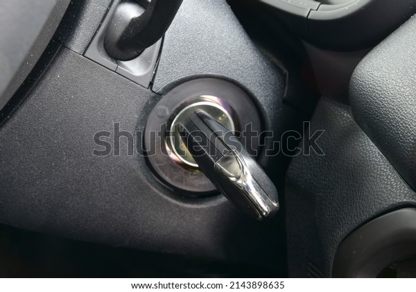Car key start the combustion of modern cars. Car\
key in keyhole.
