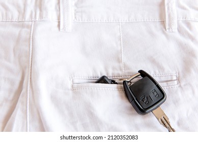 Car Key In White Pants Pocket.