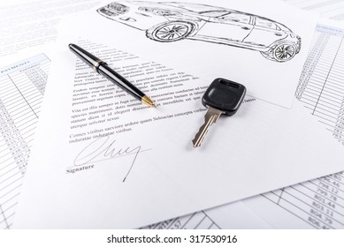Car keys on the signed agreement document (random latin dummy text used)
