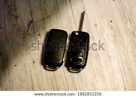 the car keys are on the surface