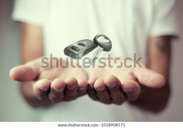 Car Keys. Seller hand\
giving keys