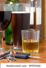 Car Keys With Wine, Beer And Whiskey  Drink Driving Concept