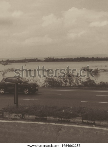 Car with lake side\
view