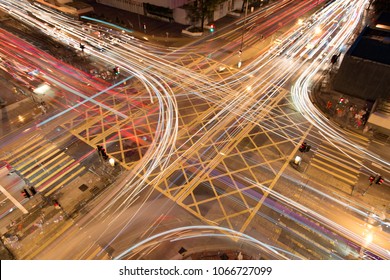 The car light trails in the city intersection - Powered by Shutterstock