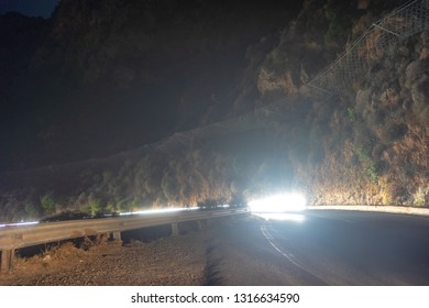 car light trails on serpentine road