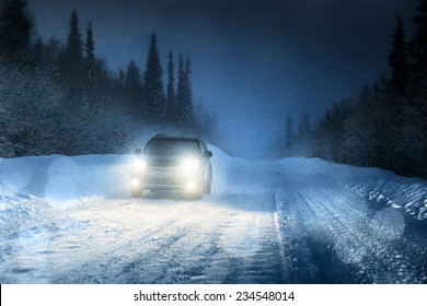 Car Lights In Winter Forest