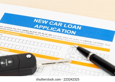 Car Loan Application With Car Key And Pen