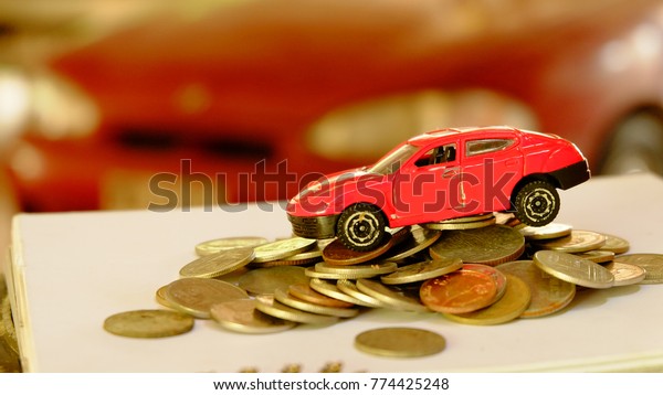 Car\
loans and insurance saving money for buy car\
concept.