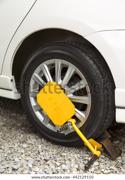 Car was locked with clamped vehicle, wheel lock.\
Parking on forbidden place.
