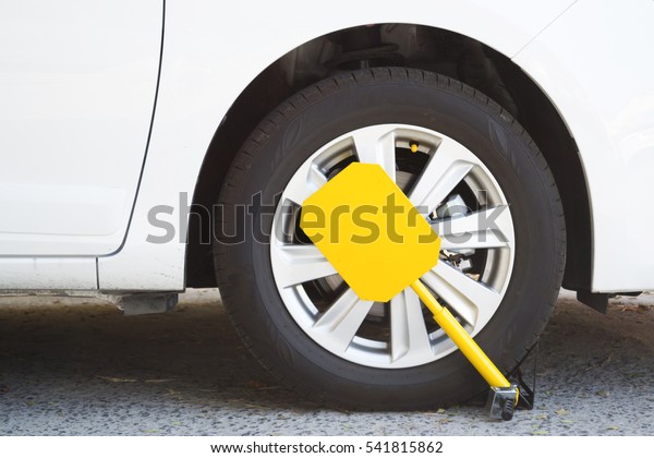 Car was locked with clamped vehicle, wheel lock.\
Parking on forbidden place.