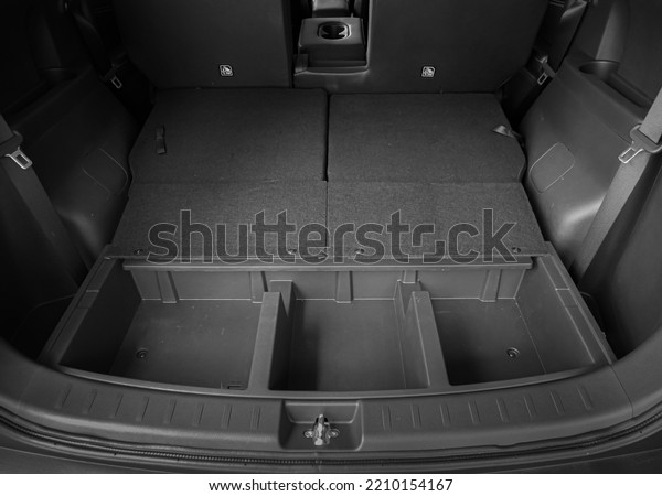 Car Luggage Compartment Tray. Three Car\
Luggage Compartment Tray is Empty\
Concept