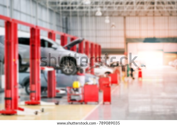 car in maintenance in garage service station,\
automobile industry