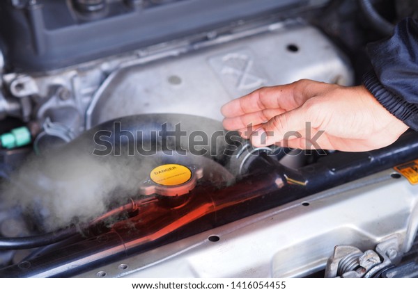 Car maintenance, car radiators help cool the\
engine Do not open the radiator cover when the engine is hot. Very\
dangerous.