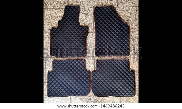a car mat,\
handmade leather mat\
appearance
