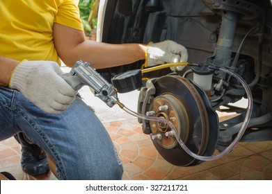 Car Mechanic Bleed Air Out Of Brake System