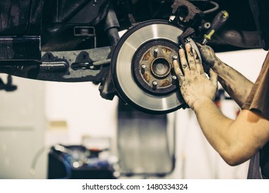 Car Mechanic Changing Car Brakes Transportation Stock Photo 1480334324 ...