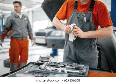 Car mechanic keeping tools polished and clean - Powered by Shutterstock