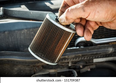 Car Mechanic Replace The Fuel Filter