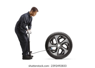 Car mechanic using a manual pump for a tire isolated on white background