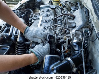 Car Mechanic Working In Auto Repair Service